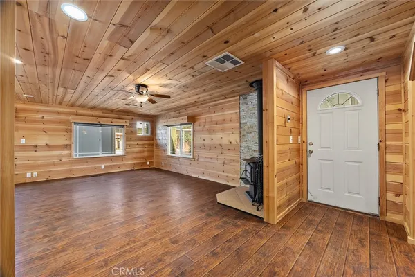 a kitchen with stainless steel appliances granite countertop a refrigerator stove and sink