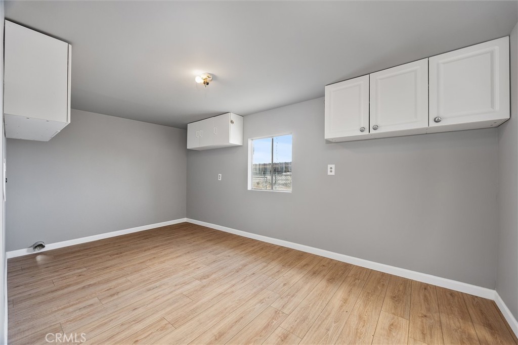 30751 Sharp Shafter, CA 93263 - Photo 27 of 73 a view of empty room with wooden floor