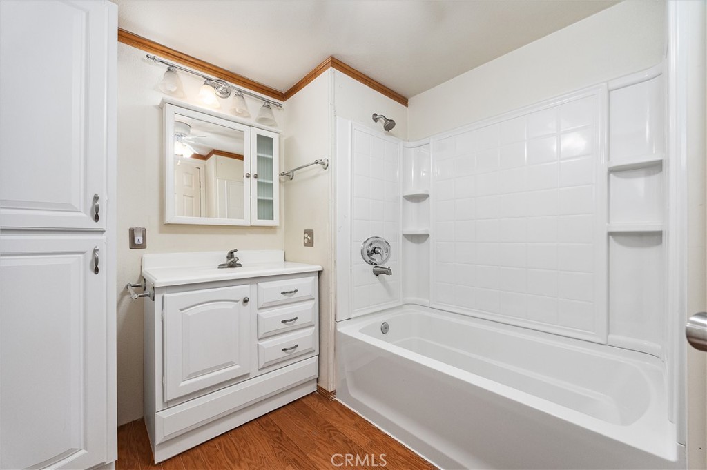 30751 Sharp Shafter, CA 93263 - Photo 28 of 73 a bathroom with a bathtub a sink and a shower
