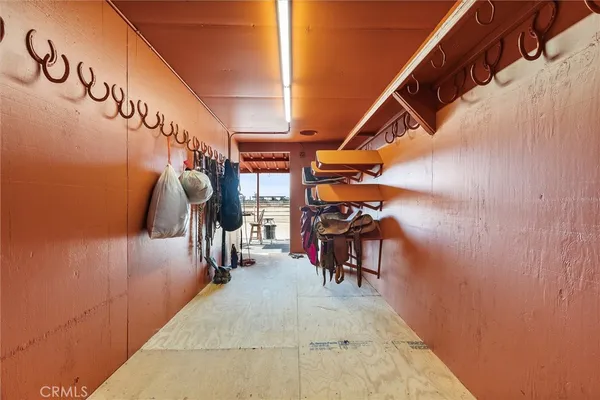 a view of a room with wooden walls