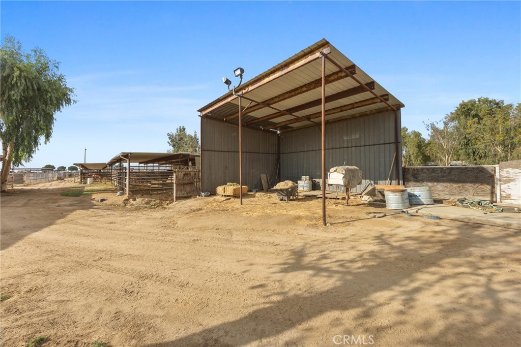 30751 Sharp Shafter, CA 93263 - Photo 47 of 73 a backyard of a house with table and chairs