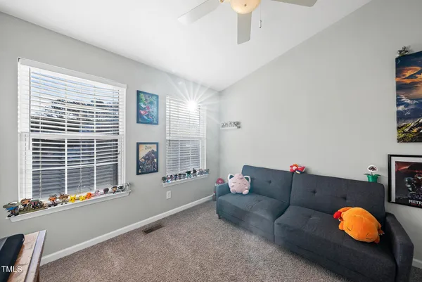 a living room with furniture and window