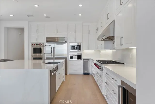 a view of a hallway with windows