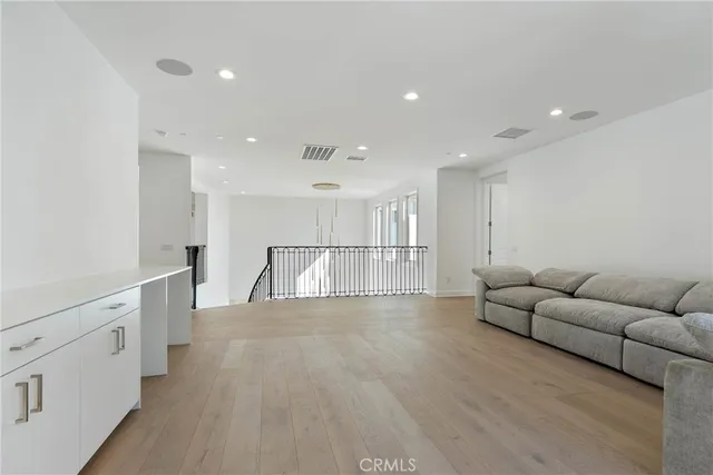 a bathroom with a sink vanity toilet and shower