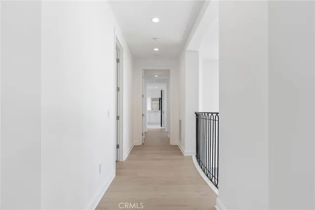 a bathroom with a granite countertop sink mirror and a bathtub