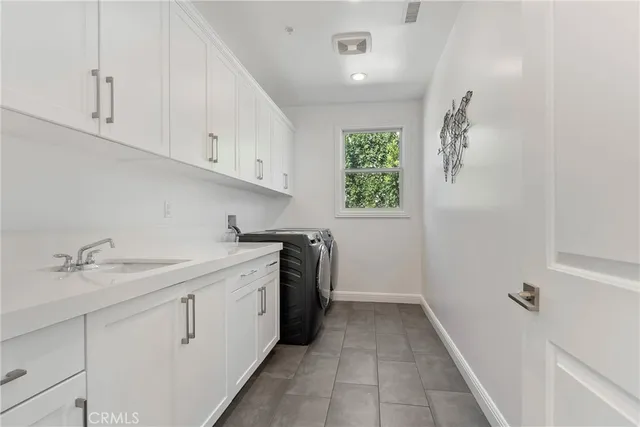 a bathroom with a sink and a shower