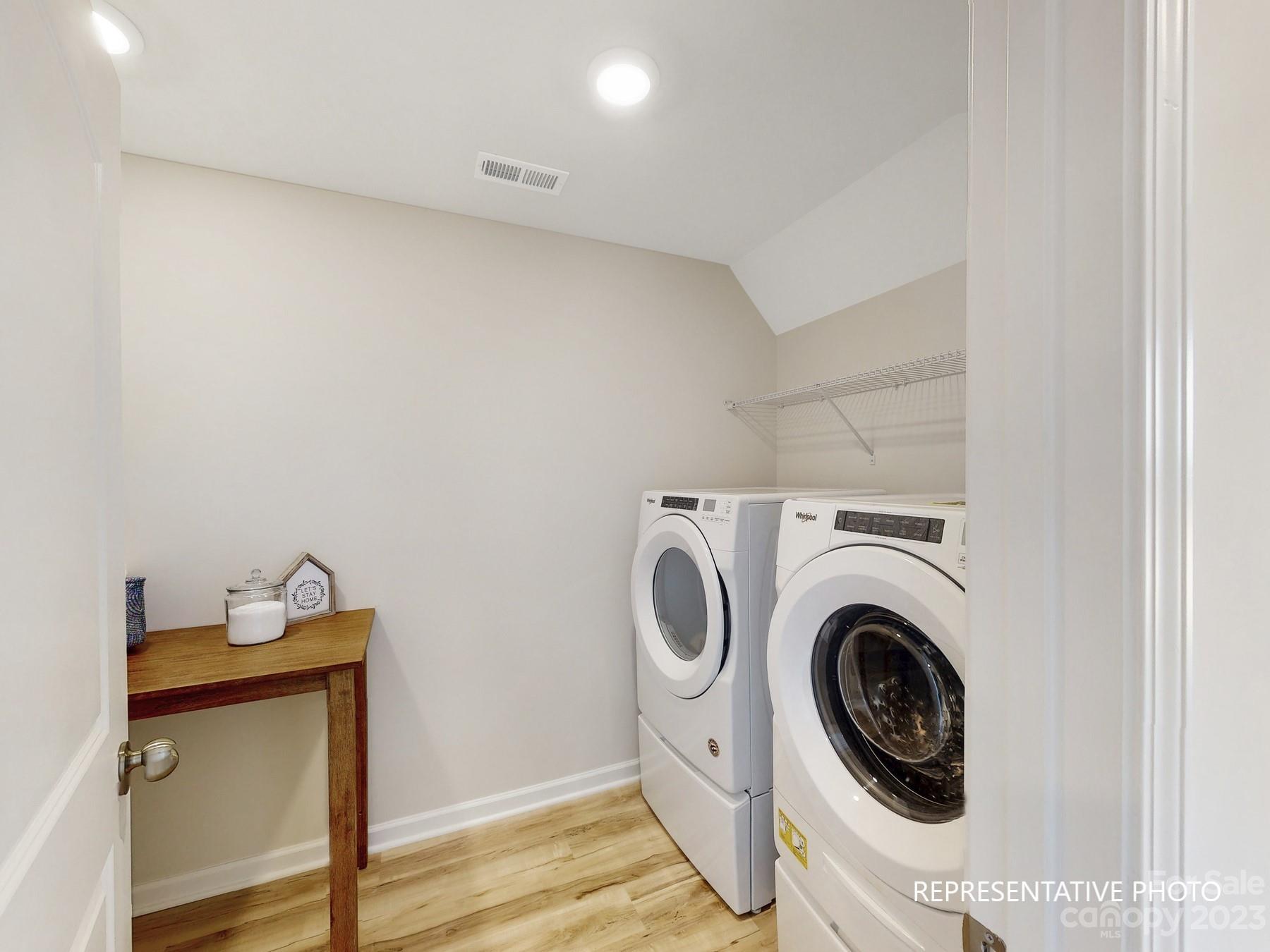 4911 Raspberry Knoll Drive, Unit 41 Charlotte, NC 28208 - Photo 17 of 29 a utility room with dryer and washer