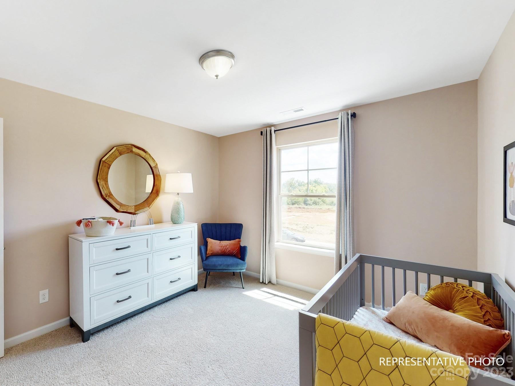 4911 Raspberry Knoll Drive, Unit 41 Charlotte, NC 28208 - Photo 6 of 29 a living room with furniture