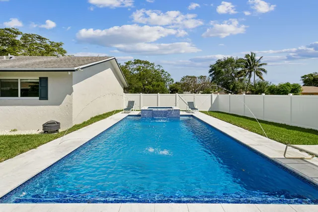 a view of an outdoor space with a hardwood