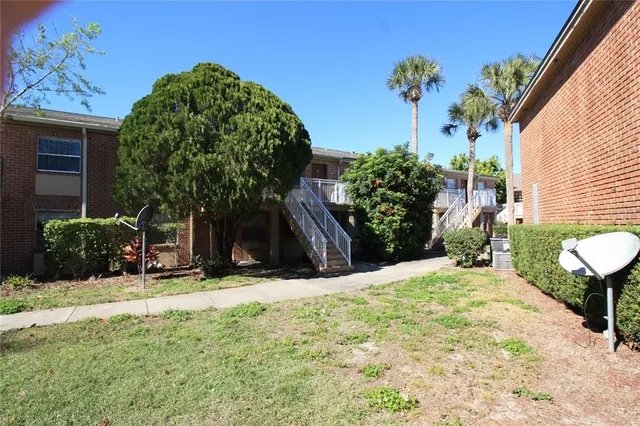 a view of a backyard of a house
