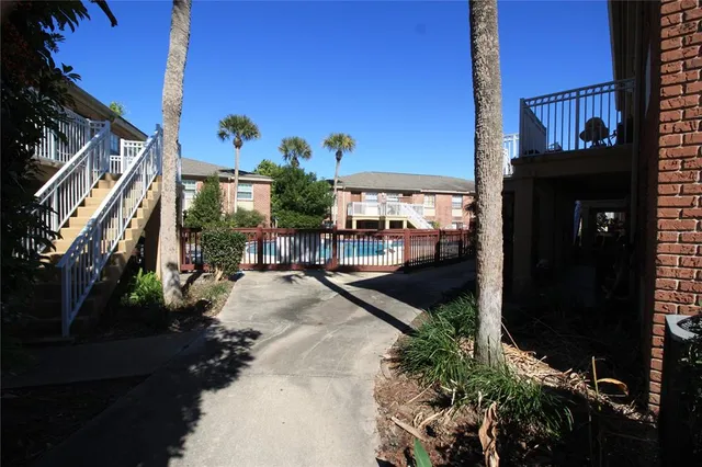 a view of potted plants in front of building