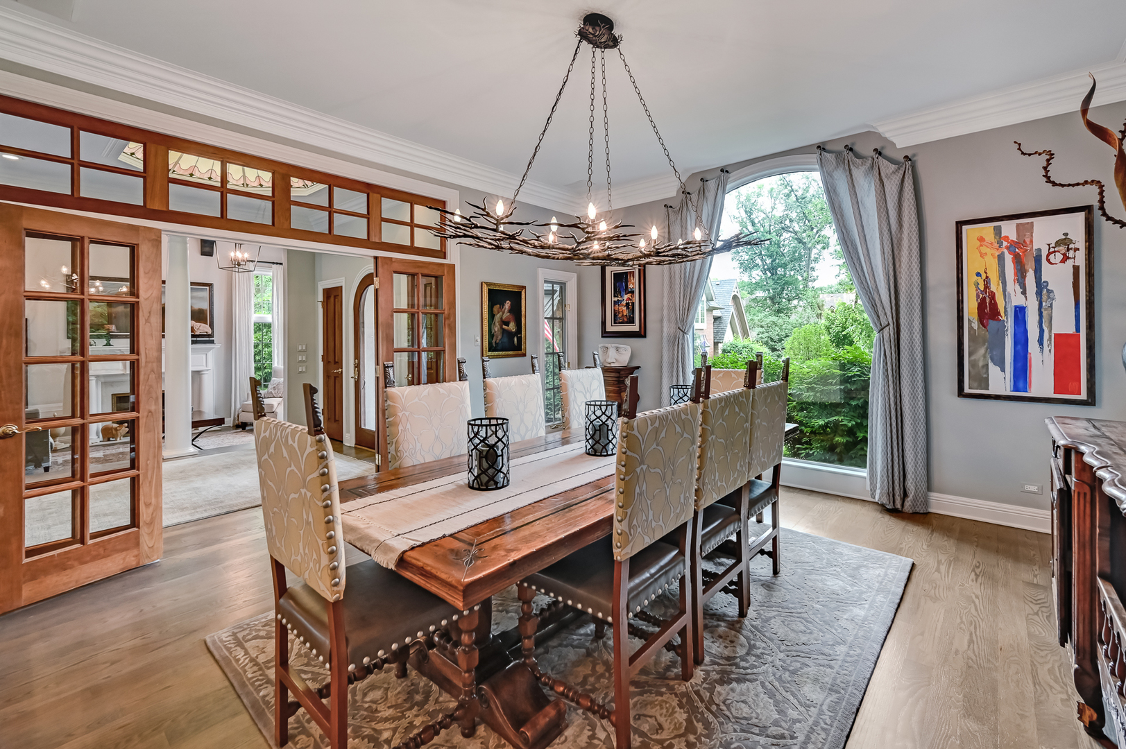 5 Norman Court Burr Ridge, IL 60527 - Photo 14 of 52 a dining room with furniture a chandelier and wooden floor