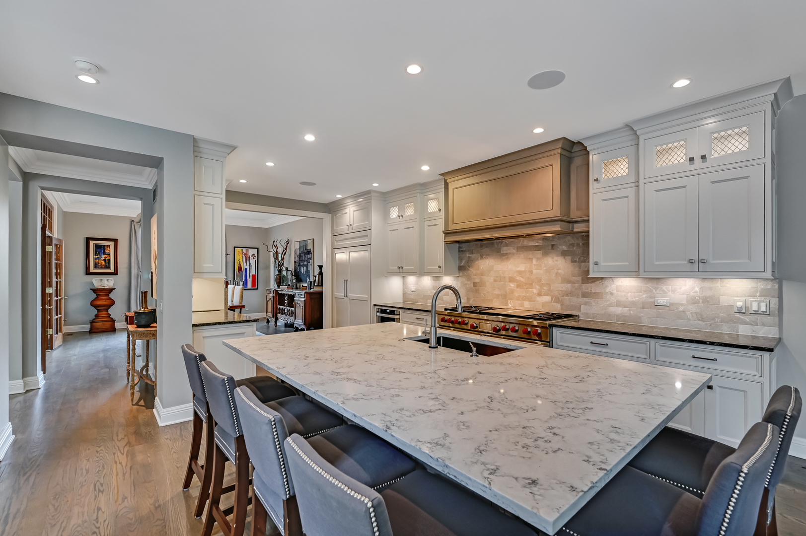 5 Norman Court Burr Ridge, IL 60527 - Photo 16 of 52 a kitchen with a table and chairs in it