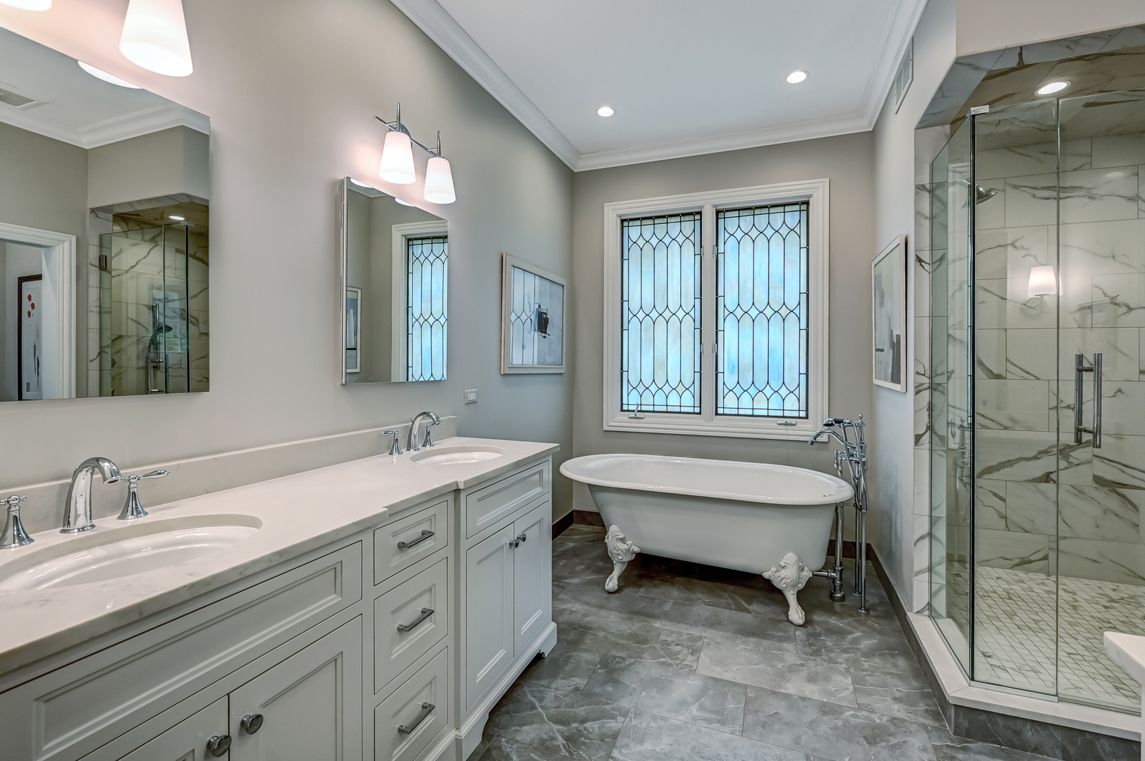 5 Norman Court Burr Ridge, IL 60527 - Photo 24 of 52 a spacious bathroom with a double vanity sink mirror and bathtub
