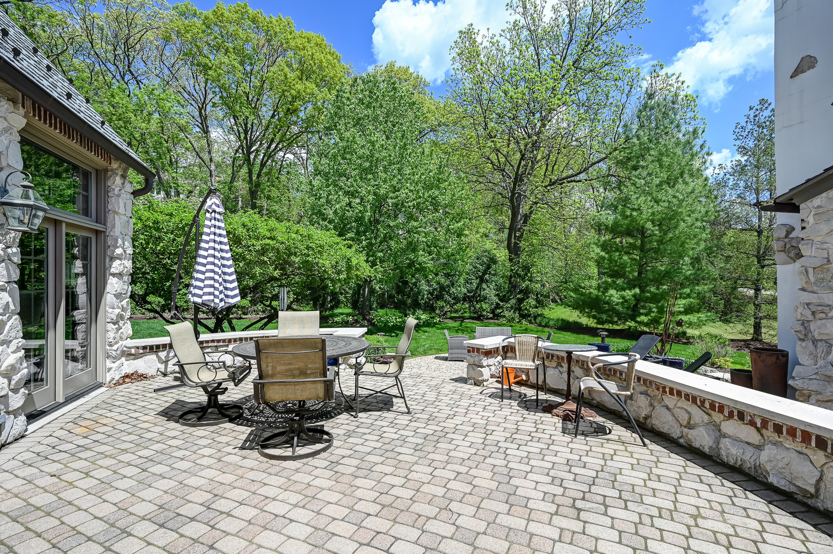 5 Norman Court Burr Ridge, IL 60527 - Photo 45 of 52 a view of backyard with a patio and outdoor seating