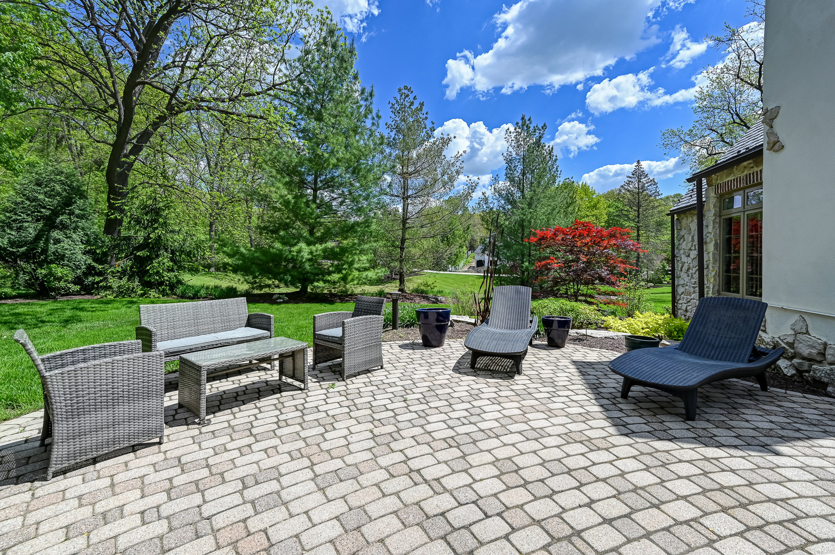5 Norman Court Burr Ridge, IL 60527 - Photo 46 of 52 a view of a patio with a table and chairs