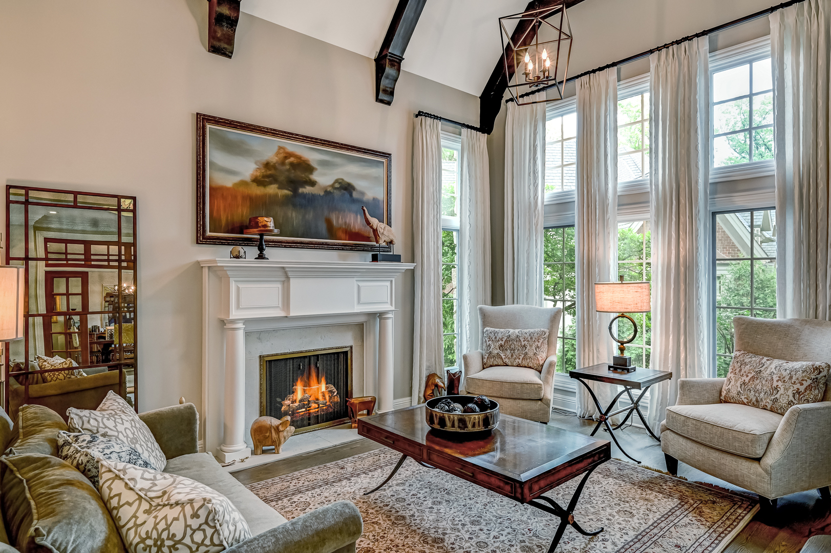 5 Norman Court Burr Ridge, IL 60527 - Photo 6 of 52 a living room with furniture a flat screen tv and a fireplace