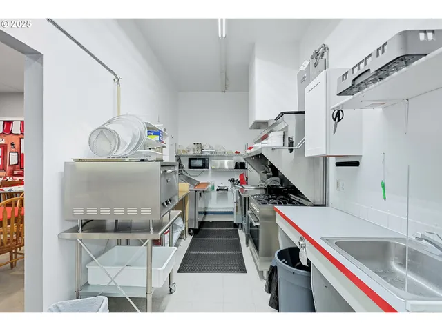 a living room with furniture and flat screen tv