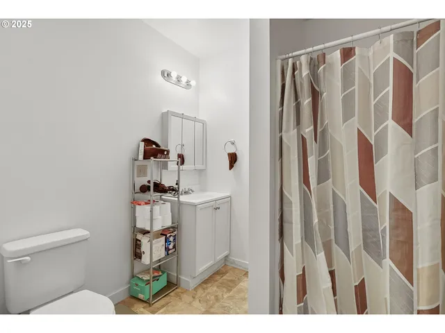 a bathroom with a sink and a toilet