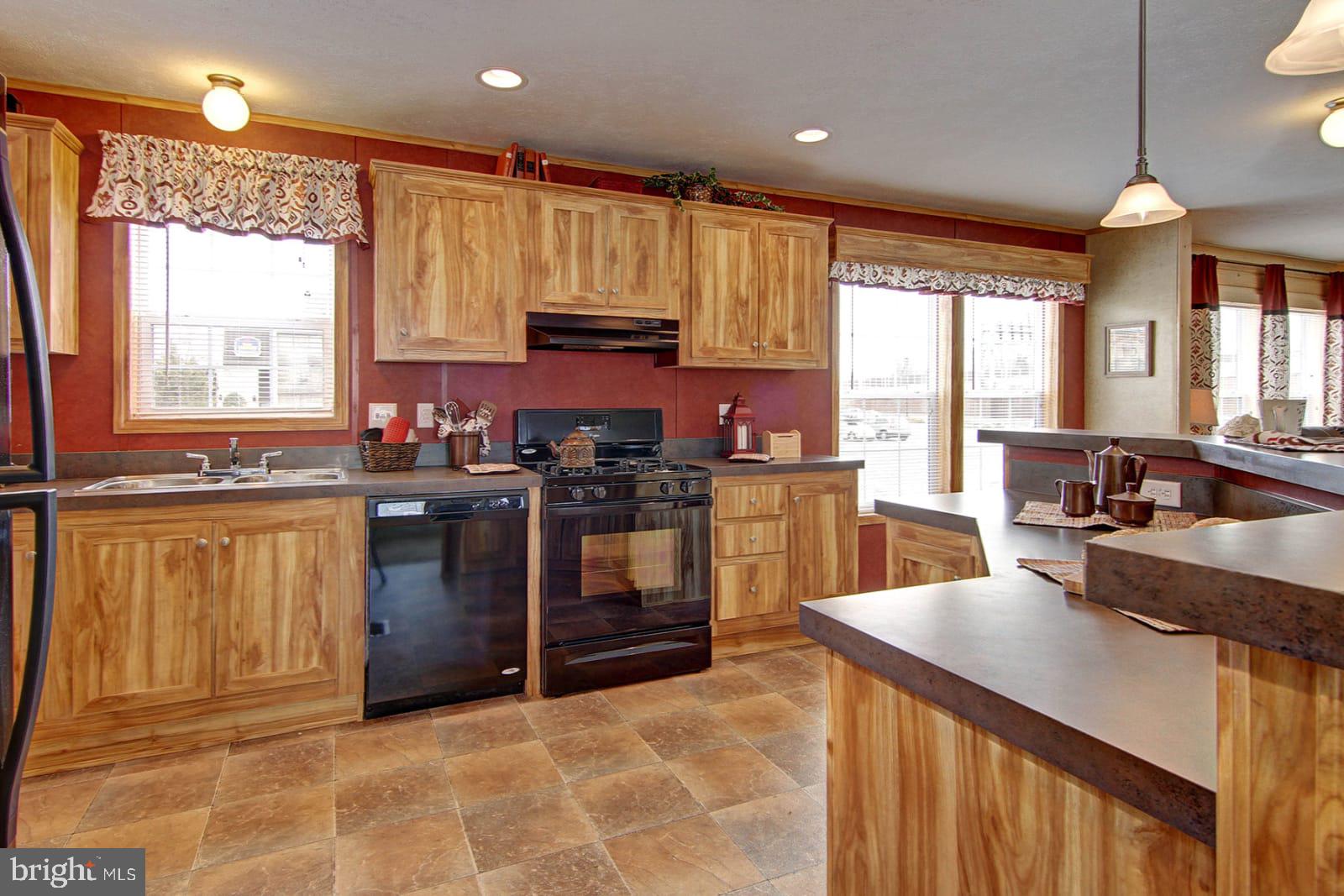 37120 Pinewood Road Ocean View, DE 19970 - Photo 12 of 25 Similar kitchen flooring, cabinets and colors