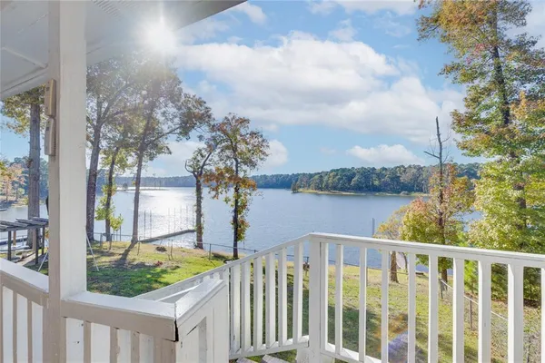 a view of a lake from a balcony