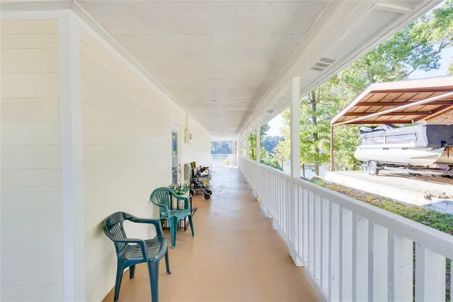 a view of a balcony with wooden floor