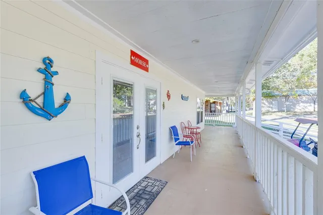 a room with a bed and a dresser