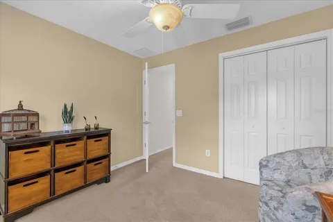 a view of livingroom with furniture and cabinet