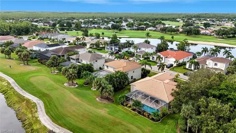 an aerial view of a house with a garden