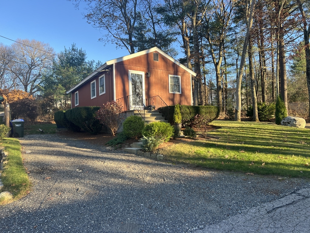 5 2nd Road, Unit 5 Hopkinton, MA 01748 - Photo 1 of 19 a front view of a house with a yard