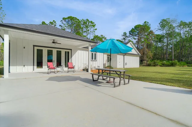 a bedroom with a bed and a table