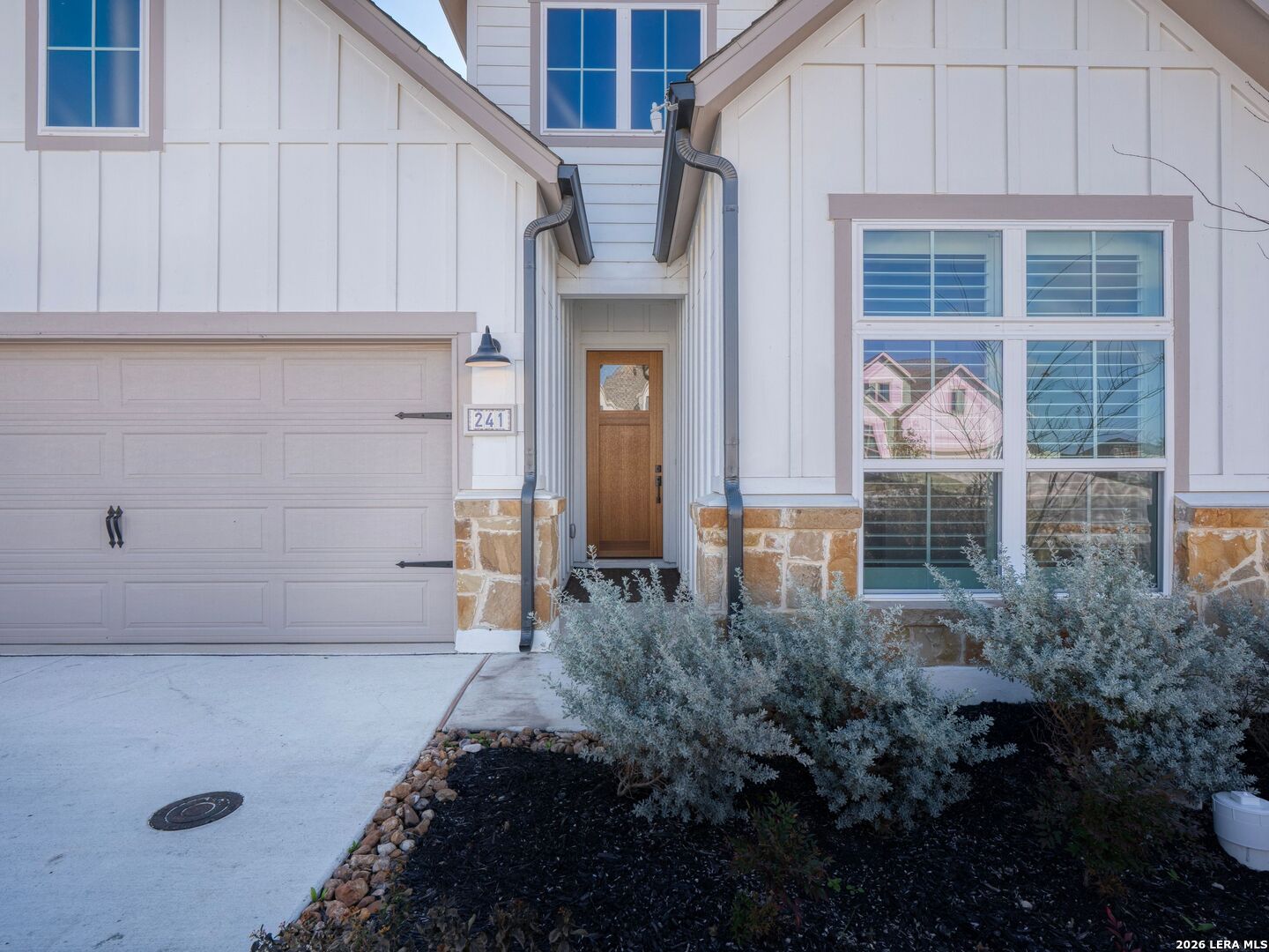 241 Sentido Boerne, TX 78006 - Photo 2 of 53 a front view of a house with a garden