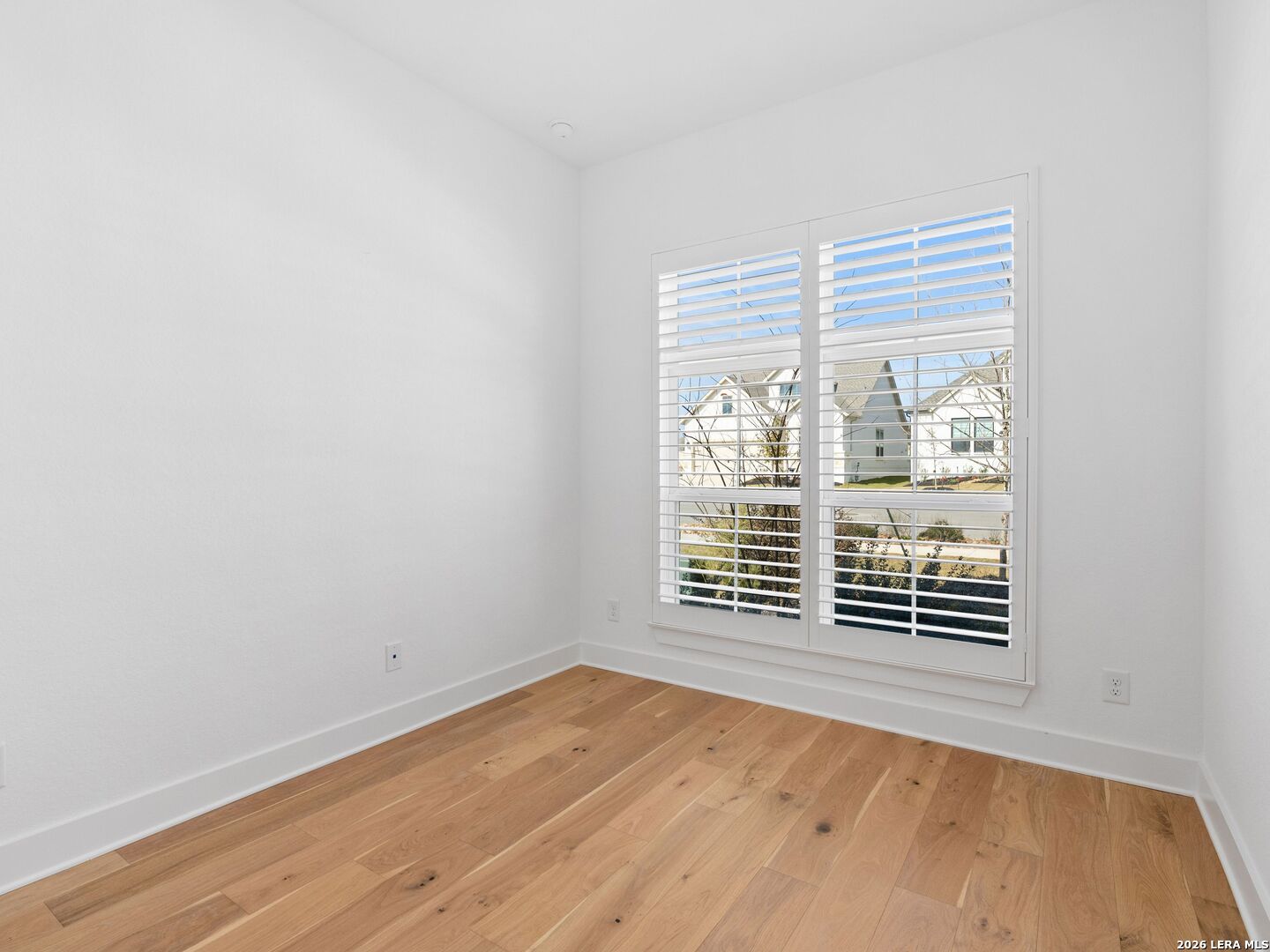 241 Sentido Boerne, TX 78006 - Photo 30 of 53 a view of empty room with wooden floor and fan
