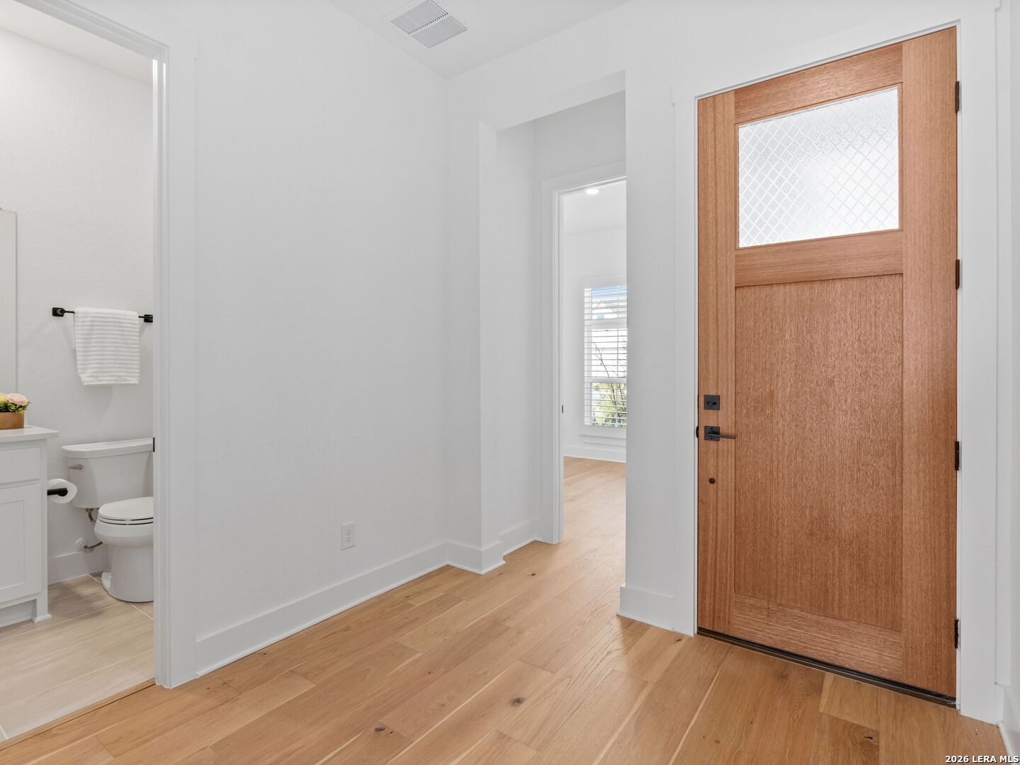241 Sentido Boerne, TX 78006 - Photo 31 of 53 a view of bathroom with a toilet a sink and a mirror