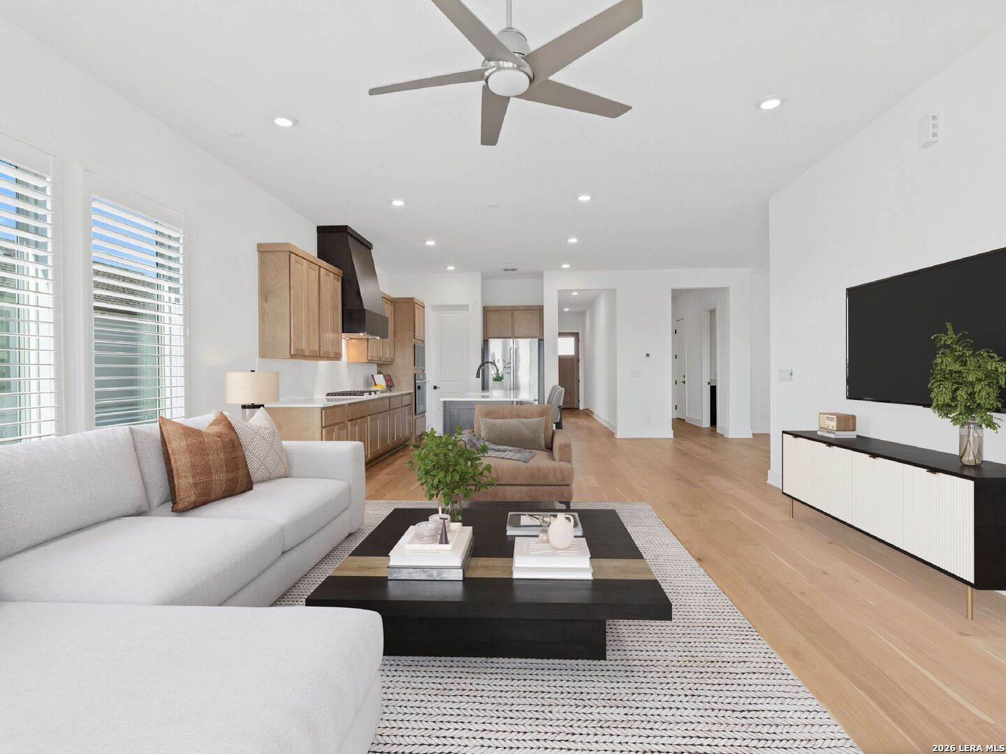 241 Sentido Boerne, TX 78006 - Photo 5 of 53 a living room with furniture and a flat screen tv