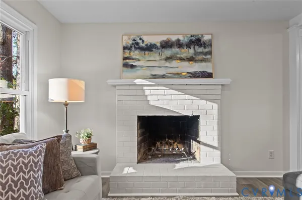 a kitchen with stainless steel appliances granite countertop a white stove top oven a sink dishwasher and a refrigerator