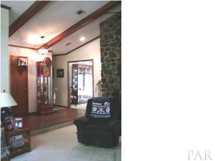 4 Brandywine Road Pensacola, FL 32507 - Photo 2 of 8 a lobby with furniture and a potted plant
