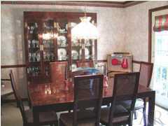 4 Brandywine Road Pensacola, FL 32507 - Photo 4 of 8 a view of a dining room with furniture and chandelier