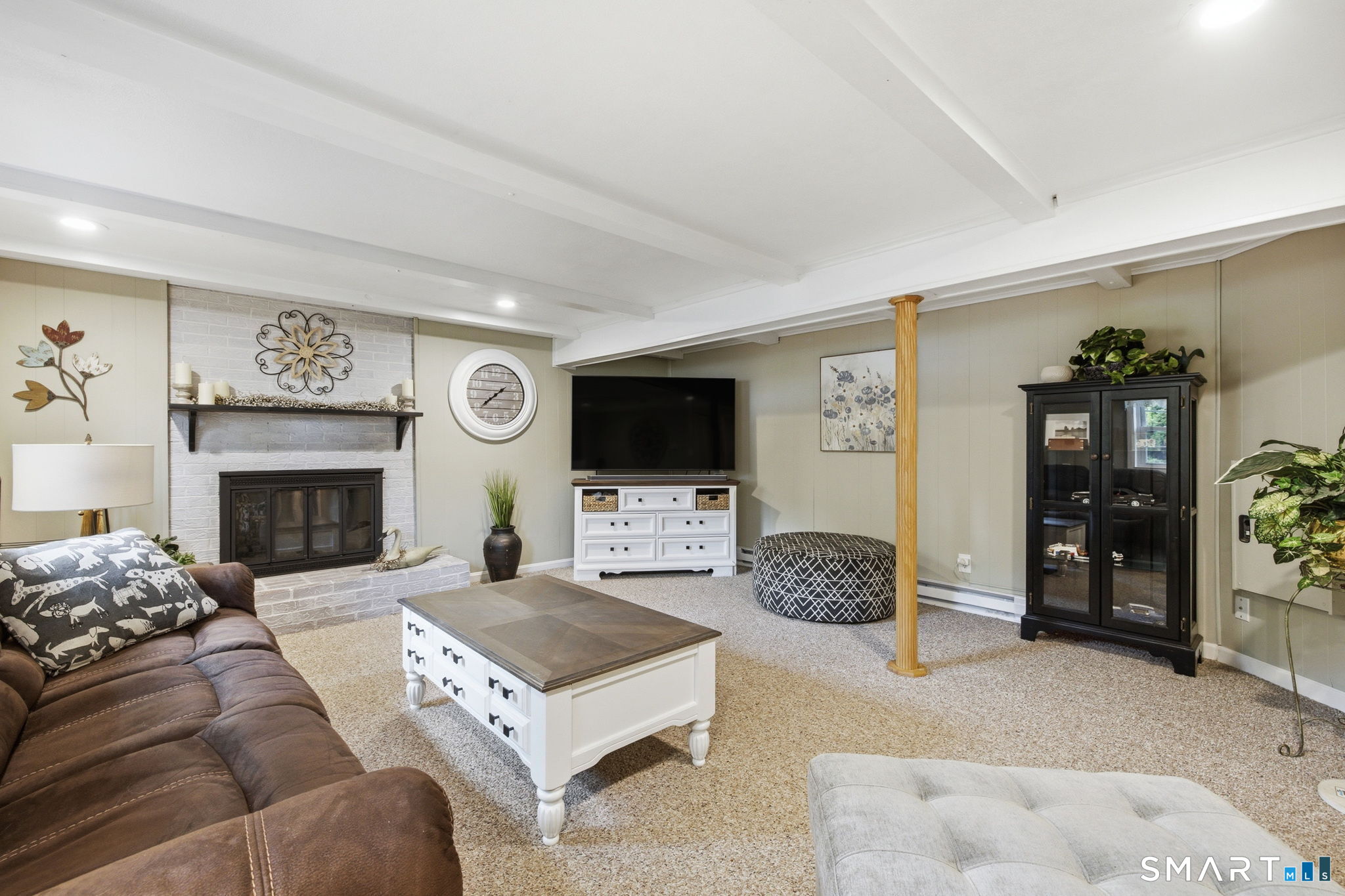 7 Stardust Drive Enfield, CT 06082 - Photo 22 of 38 a living room with furniture and a flat screen tv