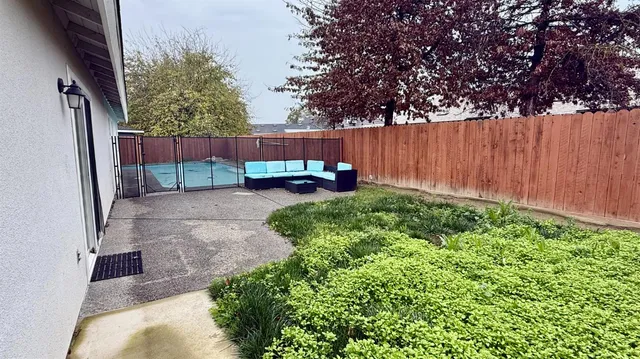 a garden view with a seating space