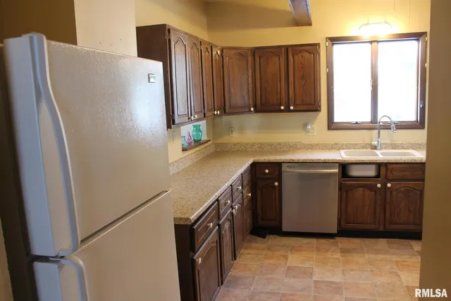 a close view of sink and washer