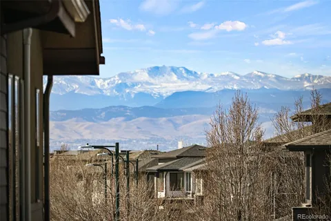 a view of a lake in middle of the city
