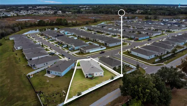 a view of a city with an ocean view