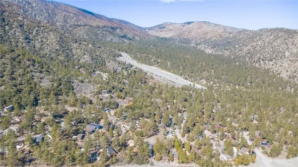 a view of mountain with trees