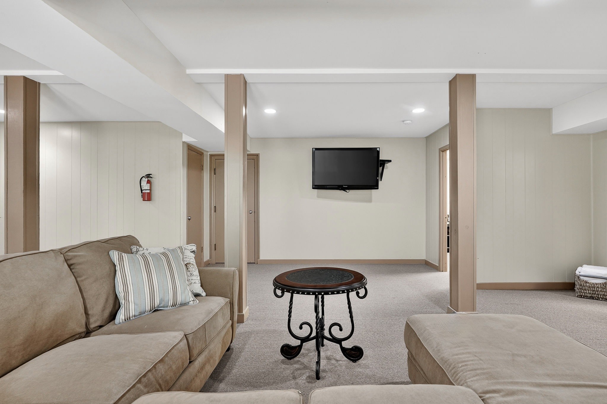 5642 Pates Ford Road Smithville, TN 37166 - Photo 23 of 32 a living room with furniture and a flat screen tv