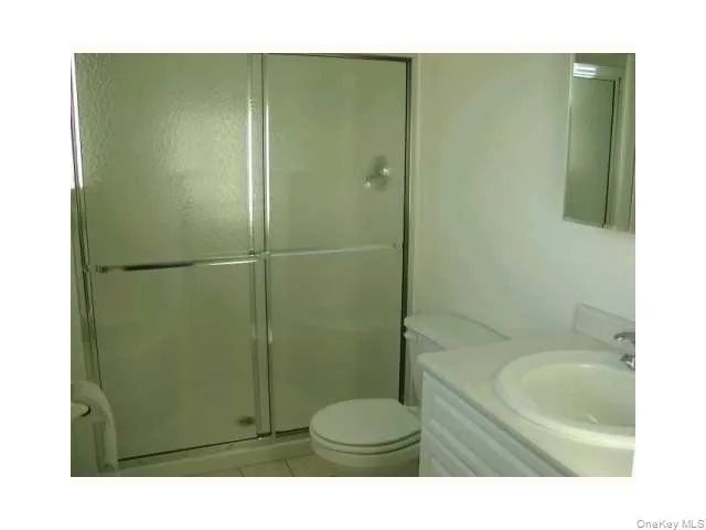 a bathroom with a sink and a shower