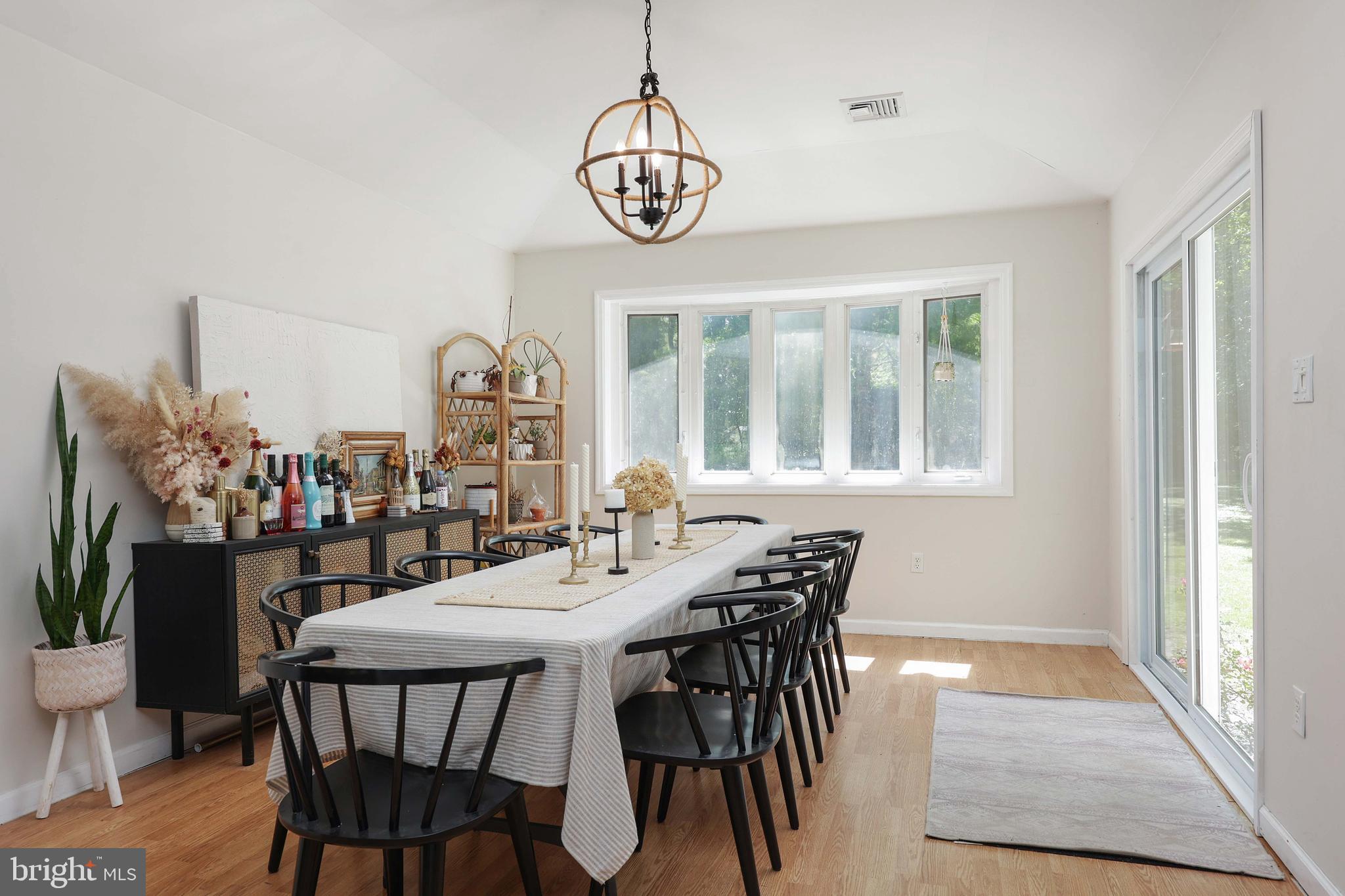 390 East Millstream Road Cream Ridge, NJ 08514 - Photo 18 of 33 a view of a dining room with furniture window and wooden floor