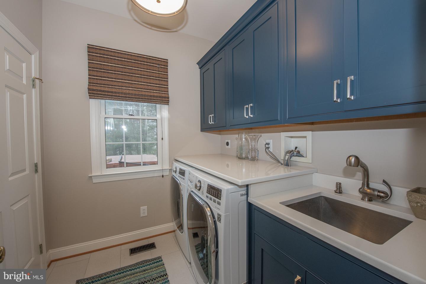 205 Pugh Road Wayne, PA 19087 - Photo 22 of 27 Laundry room with brookhaven cabinets