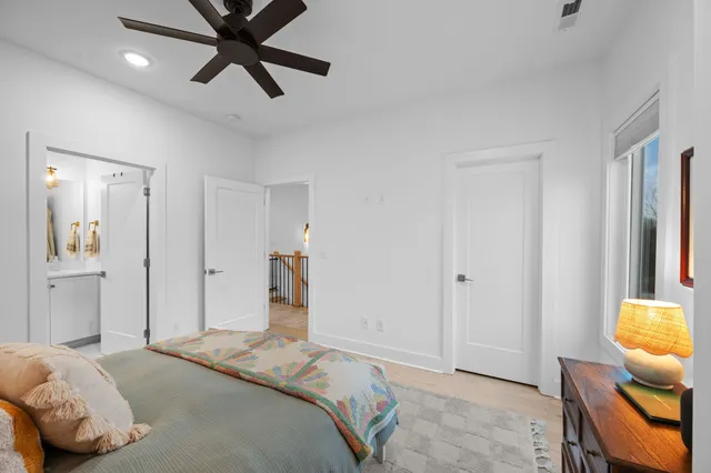 a bedroom with a bed and furniture