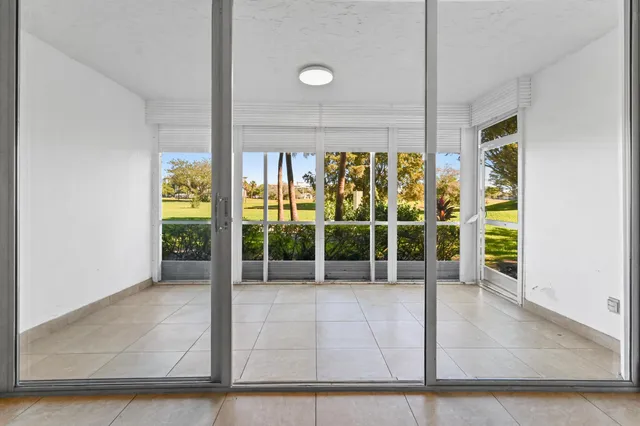 a view of a building with a garden